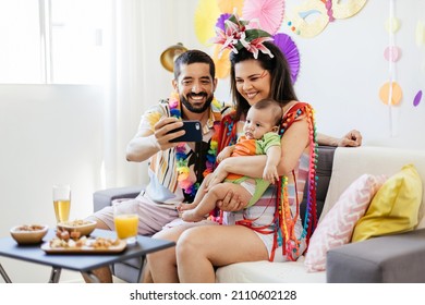 Brazilian Carnival. Family celebrating carnival at home - Shutterstock ID 2110602128