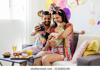 Brazilian Carnival. Family celebrating carnival at home - Shutterstock ID 2110602140