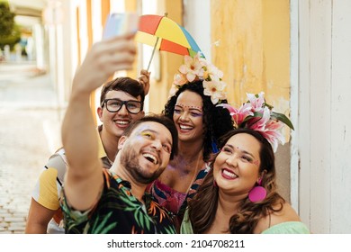Brazilian Carnival. Group of friends taking a self portrait - Shutterstock ID 2104708211
