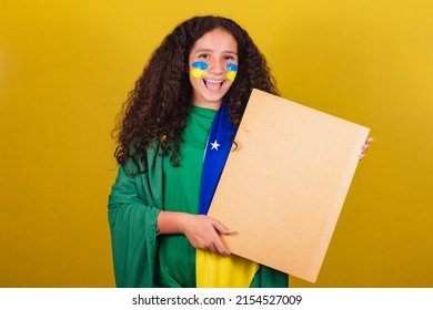 Brazilian Caucasian Girl Soccer Fan Holding Sign For Announcement, Text, Advertisement. World Cup. Olympics.