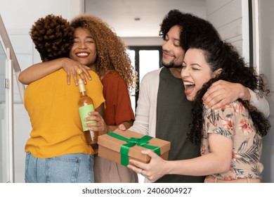 Brazilian couple welcome friends at home - Powered by Shutterstock