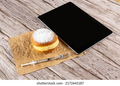 Brazilian Cream Doughnuts Next To A Syringe Taking Insulin From An Ampoule And A Tablet.