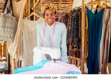 Brazilian Designer Female With Cute Blonde Afro Curls Hair Making Handmade Clothes In Her Tropical Eco House In Bali