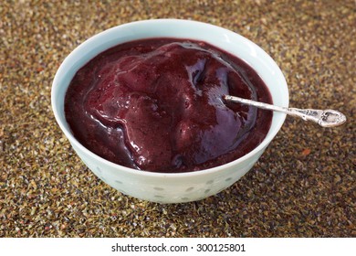 Brazilian Dessert Acai Pulp In Blue Bowl. Selective Focus