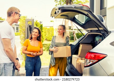 Brazilian Family Welcomed Their Daughter's Best Friend To Help Move Cardboard Boxes To A New Home Within The Housing Estate : Positive Discussion And Family Bonding Concept.