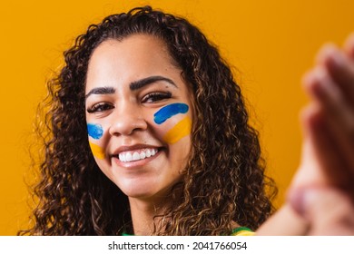 Brazilian Fan With Painted Face Taking A Selfie