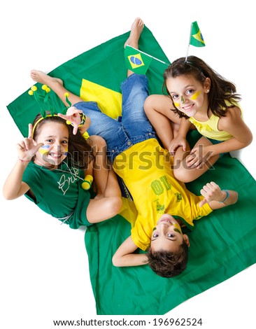 Brazilian fans Kids supporting Brazil for popular sports competitions, like soccer, volleyball and olympics.