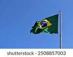 Brazilian flag and blue sky in Ribeirao Preto, Sao Paulo, Brazil