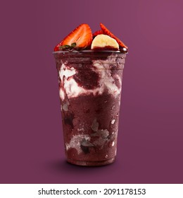 Brazilian Frozen Açai Berry Ice Cream Smoothie In Plastic Cup With Bananas, Strawberry And Condensed Milk. Isolated On Purple Background. Front View For Menu And Social Media