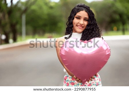 brazilian girl with heart balloon, latina, beautiful