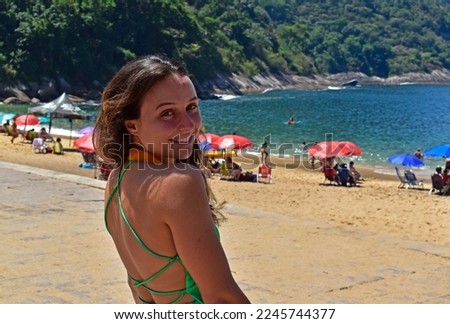 Brazilian girl smiling on the beach, Rio de Janeiro