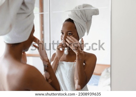 A Brazilian girl with vitiligo looking at oneself, indulging in her beauty routine. Self-love and care, beauty of diversity concept