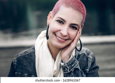 Brazilian hipster girl with beautiful smile and short pink hair. Positive pretty woman outdoors. Portrait - Shutterstock ID 1628961067