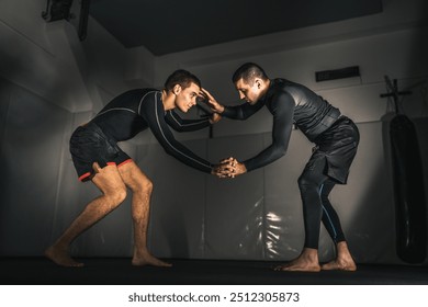 brazilian jiu jitsu bjj no gi grappling training two athletes practice - Powered by Shutterstock