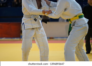 Brazilian Jiujitsu Fighters In A Fight Stand Up Wrestling At The Tournament BJJ