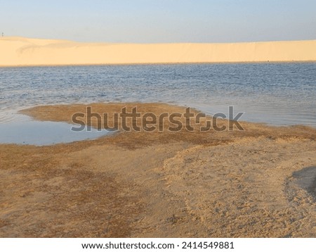Brazilian landscape with sand and still water