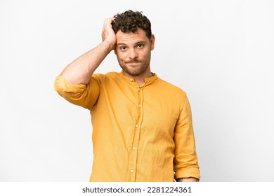 Brazilian man over isolated white background with an expression of frustration and not understanding