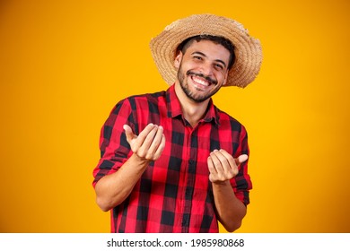 Brazilian man wearing typical clothes for the Festa Junina - Powered by Shutterstock