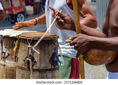 Brazilian musical instruments called berimbau and atabaque usually used during capoeira fight brought from africa and modified by the slaves in the streets of Pelourinho in Salvador, Bahia - Shutterstock ID 2171106803