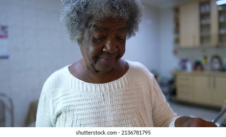 A Brazilian Older Person Cooking At Home A Senior Black Woman Preparing Food