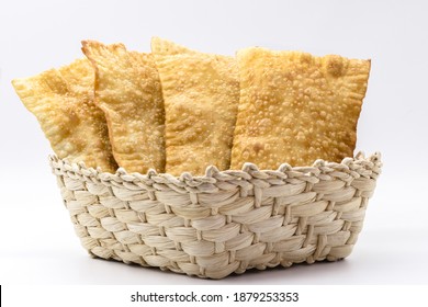 Brazilian pastry, traditional pasta called meat pastry on isolated on white background, copyspace