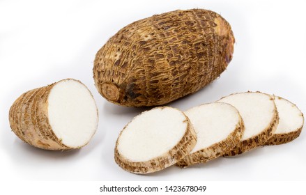 Brazilian potato known as yam, white background. In some places, it is common to refer to the following species Alocasia, Colocasia, Xanthosoma and Ipomoea, also as yam. Their tubers are also called y - Shutterstock ID 1423678049
