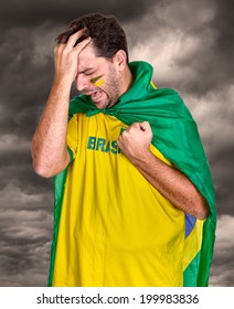 Brazilian Soccer Fan Or Supporter Crying In The Championship Or Competition Or Cup.