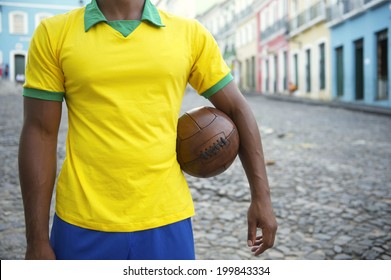 Brazilian Soccer Player Standing On Colonial Bahia Street Pelourinho Salvador With Vintage Football