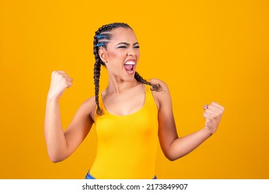 Brazilian Supporter. Brazilian Woman Fan Celebrating On Soccer Or Football Match On Yellow Background. Brazil Colors.