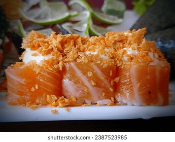 Brazilian sushi recipes with cream cheese, doritos, salmon fish, lemon. Delicious meal for hot days. Fresh raw fish.