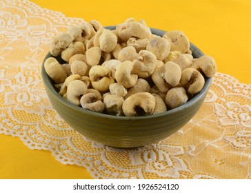 Brazilian Sweet Kettle Corn Popcorn In Ceramic Snack Bowl On White Lace Table Runner On Yellow Tablecloth