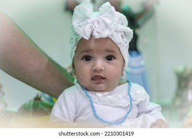 Brazilian Umbanda Child In Beaded And Religious Clothing