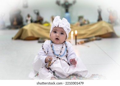 Brazilian Umbanda Child In Beaded And Religious Clothing