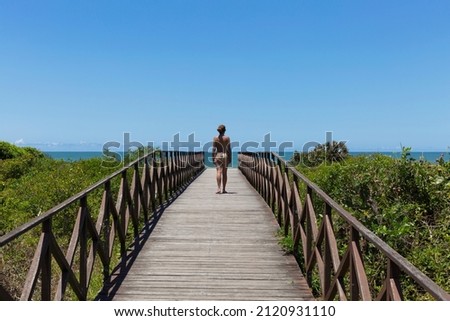 Brazilian woman at Brava Beach in Itajai Santa Catarina Brazil.