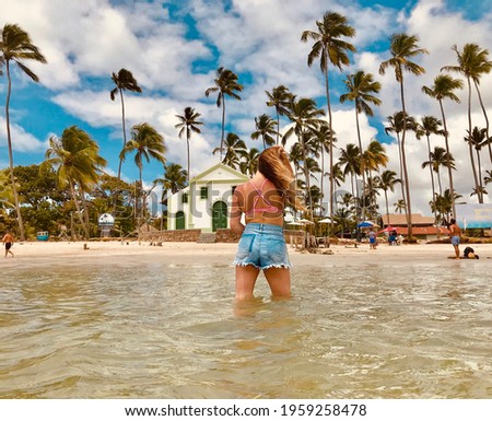 Brazilian woman at Carneiros beach in Pernambuco