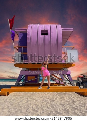 Brazilian woman in pink, in a purple lifeguard house, in Miami Beach.