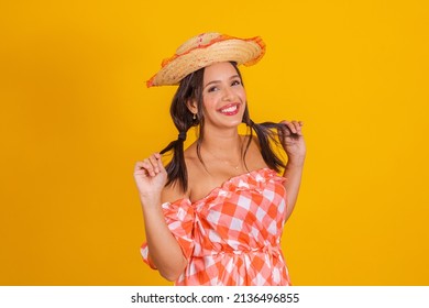 Brazilian woman wearing typical clothes for the Festa Junina. 