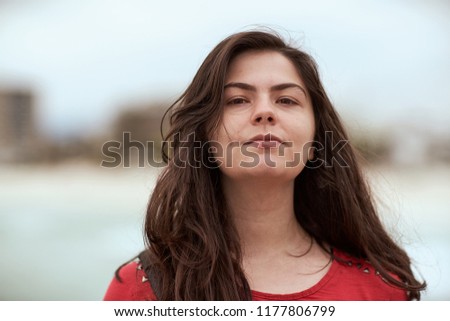 Brazilian young woman portrait in beach of Rio de janeiro