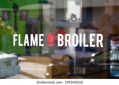 Brea, California/United States - 04/17/2019: A Door Decal Or Sign For The Rice Bowl Chain Known As Flame Broiler