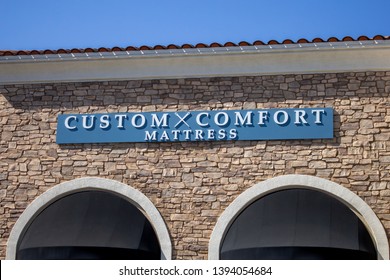 Brea, California/United States - 04/17/2019: A Store Front Sign For The Mattress Store Known As Custom Comfort