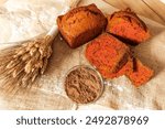 Bread with the addition of beets on canvas fabric. The concept of fortification of bread with useful additives. High quality photo