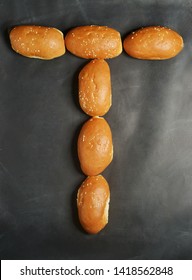 Bread Alphabet T, On A Grudge Background