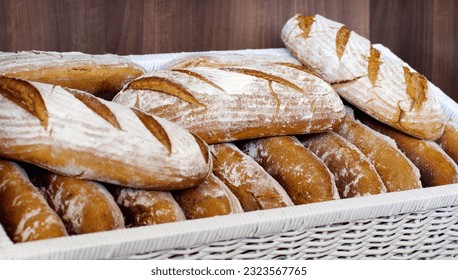 Bread in a basket, bakery presentation and food with baked goods, wheat product in store and catering. Baguette, hospitality industry with cafe or patisserie in France, nutrition and cuisine - Powered by Shutterstock