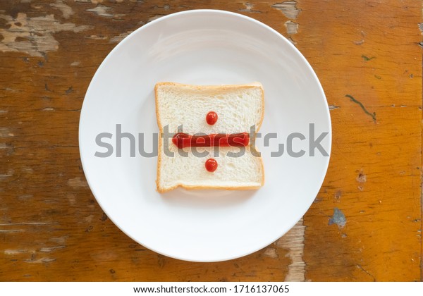 bread of
breakfast is written Divide sign by ketchup on write plate. A to Z
and Number and Special characters
set.