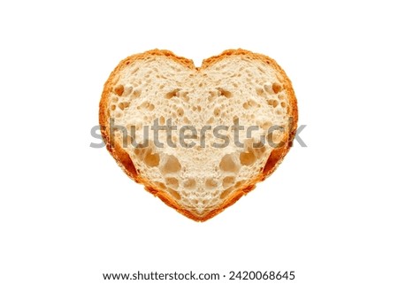 Bread cut in form of heart isolated on white background, homemade bakery concept