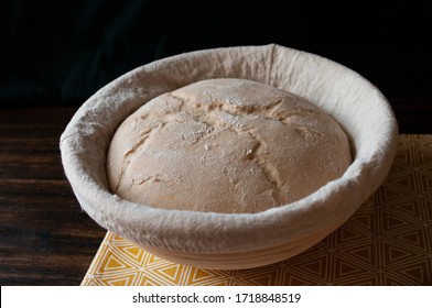 Bread dough loaf raw in proofing basket ,before baking, whole wheat recipe. Rye flour. Home made. Close up. - Powered by Shutterstock