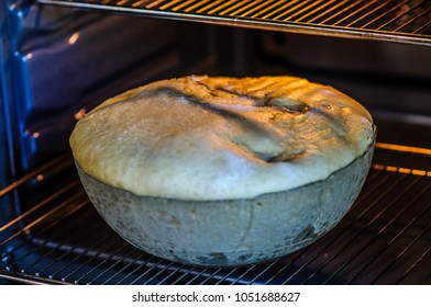 Bread Dough Rising In A Modern Oven