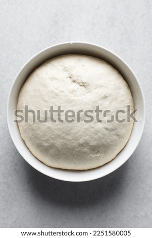 Similar – Image, Stock Photo The bread dough has risen nicely in the proofing basket