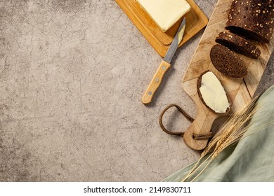 Bread with dried fruits and butter. Healthy home baked loaf top view - Shutterstock ID 2149830711