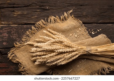 bread ears on a wooden table, rustic style - Powered by Shutterstock